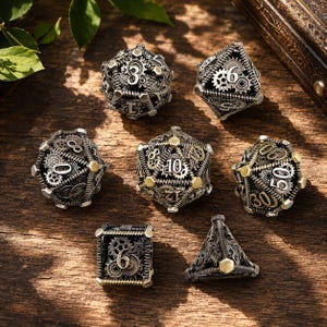 May include: A set of seven polyhedral dice featuring a complex steampunk-inspired design with intricate silver and brass-colored gears, springs, and mechanical components. Each die has raised numbers and a metallic finish, showcasing a detailed industrial aesthetic.