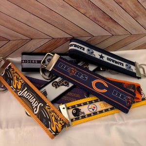 Llavero con diseño de equipo de fútbol de la NFL, llavero de pulsera, regalo para papá