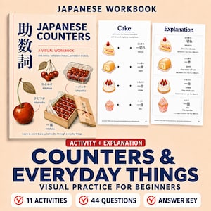 Könnte beinhalten: Ein japanisches Arbeitsbuch mit dem Titel Japanese Counters: A Visual Workbook, das Illustrationen von Kirschen in verschiedenen Mengen und Behältern sowie zwei Innenseiten mit Zählübungen für Kuchen und Erklärungen enthält.