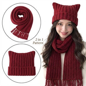 May include: A dark red knitted set consisting of a ribbed scarf with fringed ends and a matching beanie featuring two pointed cat-ear shapes at the top. The set is labeled as a 2 in 1 pattern, showcasing a textured, chunky knit construction.
