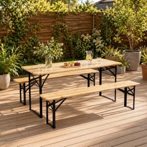 May include: A rectangular wooden beer garden table with two matching benches, featuring light-toned wood slats and black metal folding legs. The table is set with a glass pitcher of water, two glasses, and a wooden board holding bread and grapes.