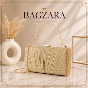 May include: A rectangular gold clutch bag with a shimmering, pleated fabric texture. It features a thin, metallic gold top handle and a detachable gold chain shoulder strap. The bag is secured with a rectangular gold clasp closure at the top.