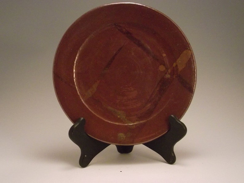 Brown plate with bronze hi lights perfect with cheese and crackers