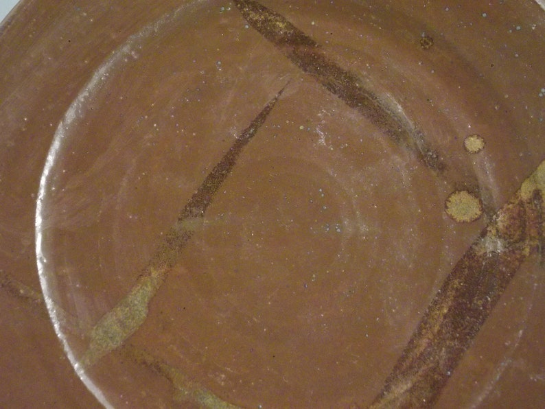 Brown plate with bronze hi lights perfect with cheese and crackers