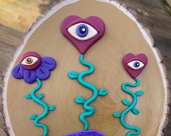 Trippy Hearts and Flower Wood Slice Artwork Clay and Yarn Painting Third Eye