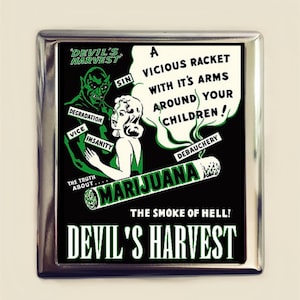 May include: A vintage anti-drug poster with a black background and green text. The poster features a devil and a woman with a cigarette that reads "MARIJUANA" and the text "DEVIL'S HARVEST: THE SMOKE OF HELL!" The poster also includes the words "SIN", "DEGRADATION", "INSANITY", "VICE", "DEBAUCHERY", and "THE TRUTH ABOUT..."