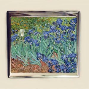 May include: A painting of a field of blue and white irises with green leaves. The painting is done in a style reminiscent of Vincent van Gogh.