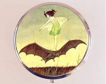 Bat Rider Pill Box Case Pillbox Holder Trinket Little Girl Riding Bat Illustration Storybook Goth