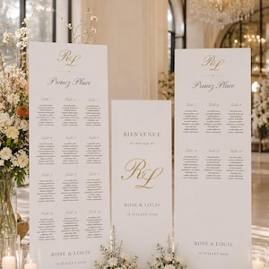 Peut inclure: Trois grands panneaux de mariage rectangulaires blancs avec lettrage doré. Les panneaux affichent le monogramme RL, le texte Prenez Place, Bienvenue au mariage de, Rose & Louis, la date 18 Juillet 2026 et des listes d'invités.