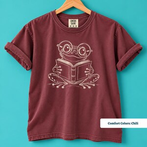 Book club sweatshirt with a cute sketch style frog wearing oversized round glasses and reading a book, cute frog shirt, book lover shirt, reading shirt, frog reading shirt, bookish shirt, book club shirt, library shirt, book lover gift, frog lover gift, frog sweatshirt, bookish sweatshirt, comfort colors shirt, bookworm gift, reader shirt, cute reading tee, book club gift, librarian shirt, frog lover shirt, bookish gift