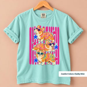 Corgi shirt featuring funny corgis with vintage inspired pink stripes, funny corgi shirt, corgi sweatshirt, corgi gifts, corgi merchandise, retro corgi shirt, pink corgi shirt, corgi mom shirt, corgi tshirt, custom corgi shirt, corgi shirt men, 90s corgi tee, corgi lover gift