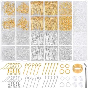 May include: A clear plastic organizer box containing gold and silver jewelry findings, including earring hooks, headpins, jump rings, and clear earring backs. Below the box are loose samples of these components, a gold ring, and metal tweezers.