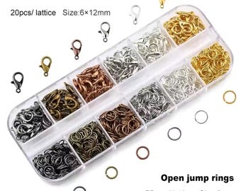 May include: A clear plastic organizer box containing assorted metal jewelry findings. The set includes lobster clasps measuring 6x12mm and open jump rings measuring 6mm in various metallic finishes including gold, silver, bronze, and black.
