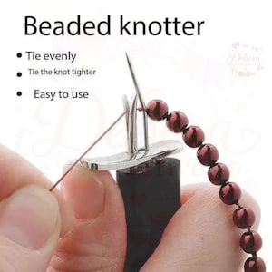 May include: A metal beaded knotter tool with a black handle, featuring a forked tip and a needle used to secure dark red beads on a string. The text reads Beaded knotter, Tie evenly, Tie the knot tighter, and Easy to use, demonstrating its function.