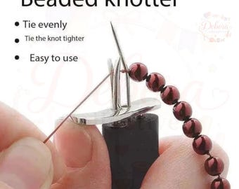 May include: A metal beaded knotter tool with a black handle, featuring a forked tip and a needle used to secure dark red beads on a string. The text reads Beaded knotter, Tie evenly, Tie the knot tighter, and Easy to use, demonstrating its function.
