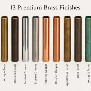 May include: Thirteen cylindrical metal tubes displayed in a row, showcasing various finishes labeled as Polished Brass, Brushed Brass, Antique Brass, Blackened Brass, Polished Chrome, Brushed Chrome, Polished Copper, Brushed Copper, Aged Brass Patina, Dark Patina, Verdigris Patina, Copper Patina, and Black Matte.