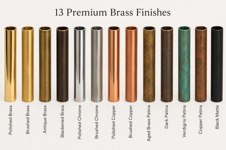 May include: Thirteen cylindrical metal tubes displayed in a row, showcasing various finishes labeled as Polished Brass, Brushed Brass, Antique Brass, Blackened Brass, Polished Chrome, Brushed Chrome, Polished Copper, Brushed Copper, Aged Brass Patina, Dark Patina, Verdigris Patina, Copper Patina, and Black Matte.