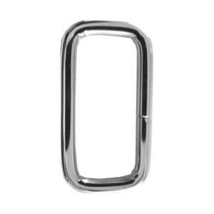 May include: A silver metal D-ring with a smooth finish.