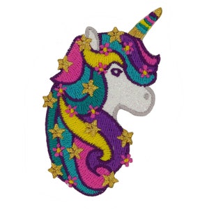 May include: A white unicorn head with a gold horn and mane, surrounded by pink, purple, teal, and yellow flowers and gold stars.