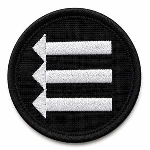 May include: A circular embroidered patch with a black background and a white stitched design. The design features three horizontal white bars, each ending in a pointed arrow shape on the left side, creating a stylized letter E formation.