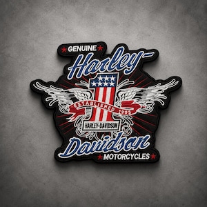 May include: A black embroidered patch featuring the text Genuine Harley-Davidson Motorcycles. The design includes a large number one with red and white stripes and blue stars, flanked by white wings and a red banner reading Established 1903.