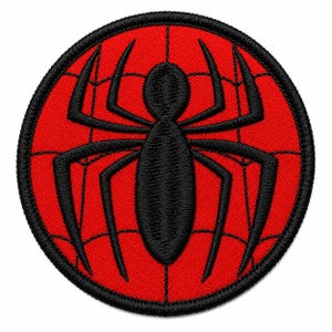 May include: A circular embroidered patch featuring a vibrant red background with a black spider web pattern. Centered on the patch is a large, solid black spider icon with eight long, slender legs. The entire design is bordered by a thick black edge.