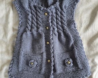 Hand knitted children vest. Sleeveless Jumper