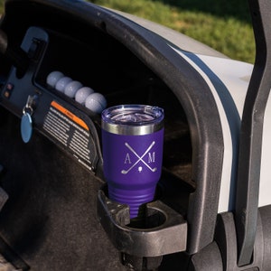 Purple women's golf tumbler in golf cart