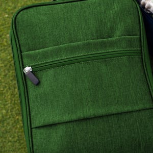 Extra zipper storage for tees and golf balls