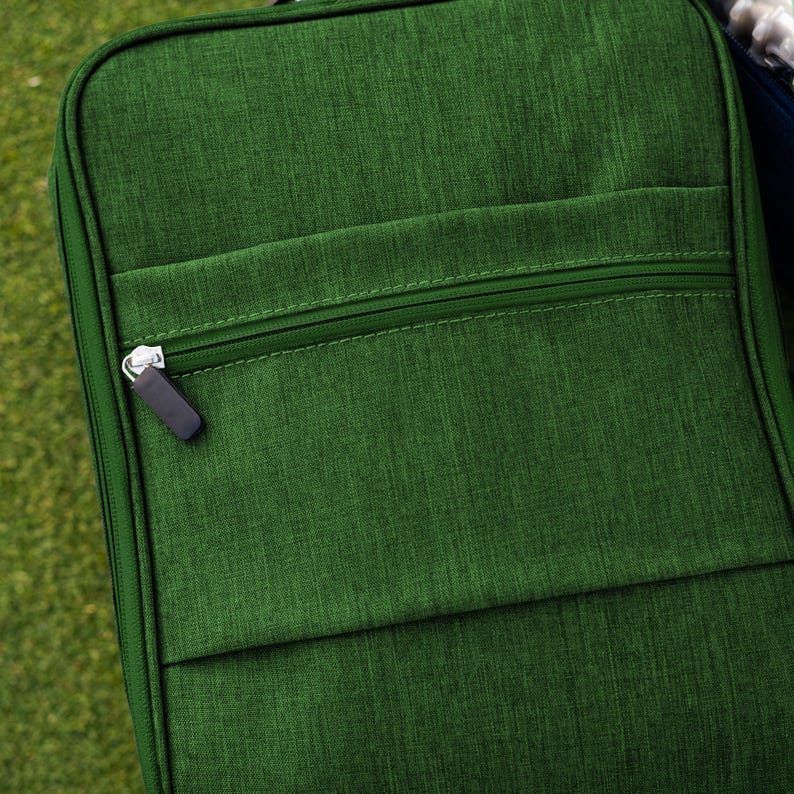 Extra zipper storage for tees and golf balls