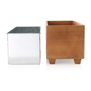 May include: Two rectangular planters, one made of metal and the other made of wood. The metal planter is silver and the wooden planter is brown.