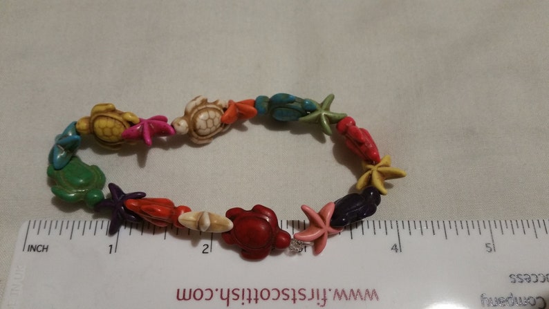 larger Multicoloured turle and star fish shell bead bracelet