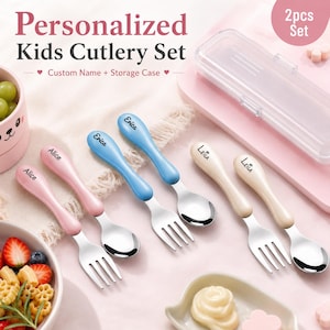 May include: A personalised kids cutlery set featuring two-piece sets of forks and spoons with pastel pink, blue, and cream handles. Each handle is printed with a custom name. The set includes a clear plastic storage case and metal utensils.