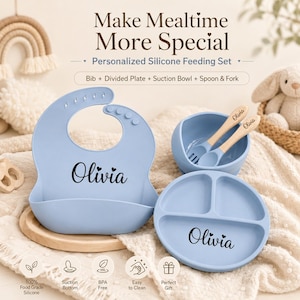 May include: A light blue silicone feeding set featuring a bib, a divided plate, a suction bowl, and a spoon and fork with wooden handles. Each item is personalized with the name Olivia. The text Make Mealtime More Special is visible.