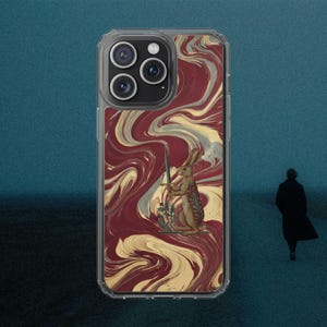 May include: A clear phone case featuring a design of a rabbit standing on its hind legs and holding a sword. The background of the design consists of swirling patterns in shades of deep red, cream, and muted grey, creating a marbled effect.