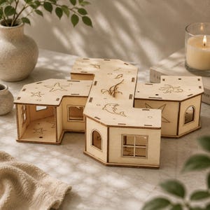 May include: A modular wooden structure featuring multiple connected rooms with arched and square windows. The light-coloured wood surfaces are engraved with marine-themed illustrations including a dolphin, starfish, octopus, and seaweed.