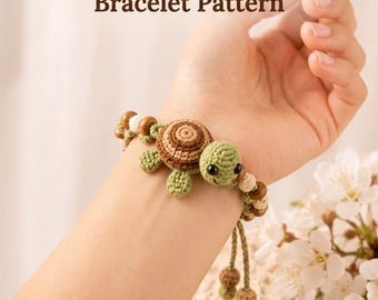 May include: A crochet bracelet featuring a small turtle with a brown shell and light green body, accented with brown and white wooden beads. The text reads Crochet Tiny Turtle Bracelet Pattern and Instant PDF Download.