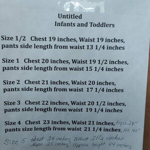 May include: A white sheet of paper with handwritten measurements for infants and toddlers clothing sizes. The measurements are in inches and include chest, waist, hips, and approximate height. The paper is titled "Untitled Infants and Toddlers" and is labeled "Page 1".