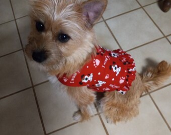 Girls ruffled harness vest.