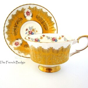 Yellow and gold Paragon Pembroke B Teacup and Saucer set ~ Ornate gold scroll Design  with Floral border Made in ENGLAND Tea Cup