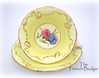Paragon gele vintage theekop en schotel set roze en blauwe bloem, gemaakt in ENGLAND theekop