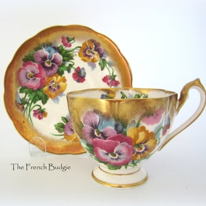 Queen Anne &quot;Spring Melody&quot; Purple, Pink and Yellow Pansy Teacup and Saucer with heavy gilding Set