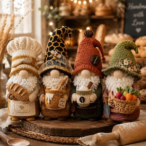 May include: Four crocheted gnome figurines standing in a row. The first wears a chef hat and holds bread. The second has a black and yellow honeycomb hat with a bee and holds a honey pot labeled Sweet as honey. The third wears a rust hat with a coffee bean and holds a mug. The fourth wears a green hat with flowers and holds a basket of vegetables.
