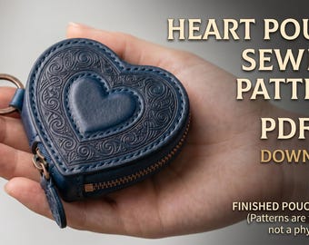 May include: A dark blue heart-shaped pouch with an embossed swirling pattern, a metal zipper, and a key ring. The text reads: HEART POUCH SEWING PATTERN PDF DOWNLOAD. FINISHED POUCH SHOWN (Patterns are for sewing, not a physical item).