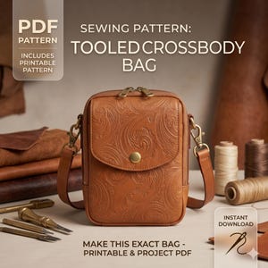 May include: A tan crossbody bag with a tooled paisley pattern, a front flap with a gold-tone snap closure, and a zipper top. Text on the image reads: PDF PATTERN, SEWING PATTERN: TOOLED CROSSBODY BAG, INCLUDES PRINTABLE PATTERN, INSTANT DOWNLOAD.