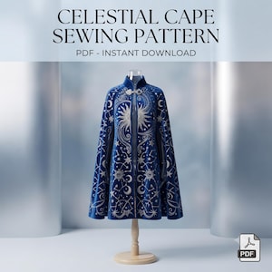 May include: A deep blue cape featuring silver celestial embroidery of suns, moons, and stars. The text CELESTIAL CAPE SEWING PATTERN PDF - INSTANT DOWNLOAD is displayed above. The cape is displayed on a mannequin stand with a silver clasp at the neck.