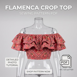 Puede incluir: Un top corto color coral de hombros descubiertos con doble volante y estampado de granadas y aceitunas. El texto dice FLAMENCA CROP TOP SEWING PATTERN PDF, DETAILED PHOTO TUTORIAL, SHOP PATTERN NOW y PDF A4 / US LETTER.