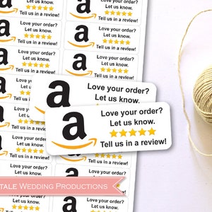 May include: A sheet of white stickers with the Amazon logo and the text "Love your order? Let us know. Tell us in a review!" printed on them. The stickers are arranged in rows and columns.