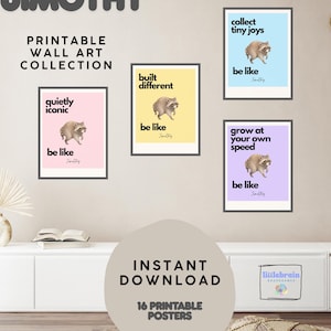 May include: A collection of four printable wall art posters featuring raccoon illustrations and text. The posters include phrases like 'quietly iconic', 'built different', 'collect tiny joys', and 'grow at your own speed' with the signature 'be like Jimothy'.