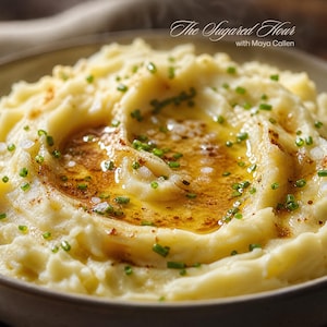 May include: A bowl of creamy mashed potatoes topped with a pool of melted golden butter, a dusting of brown spices, and finely chopped green chives. The text "The Sugared Hour with Maya Callen" is visible in the upper right corner of the image.